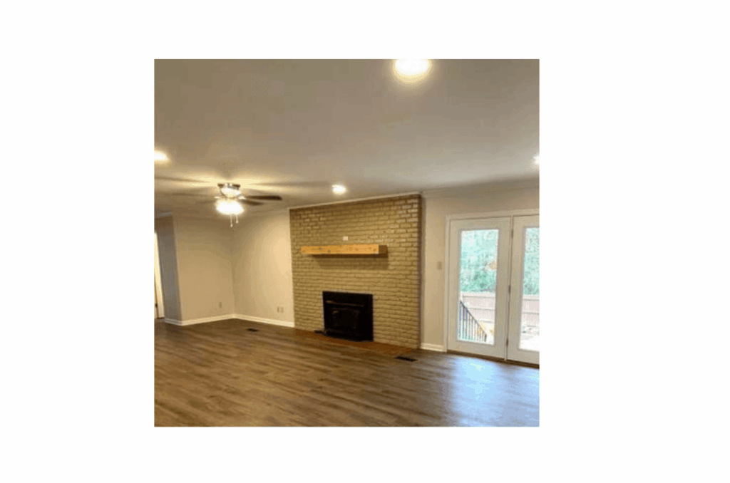 Plain brick fireplace with a vintage firebox